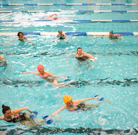 A group of people participating in an aqua class in the pool at Richmond Recreation Centre