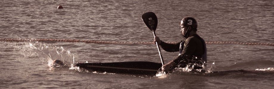 A man rowing in the water