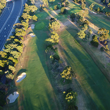 aerial view of Burnley Golf Course and citylink freeway running next to it