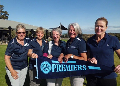 Burnley Womens Golf Club premiership team holding the pennant