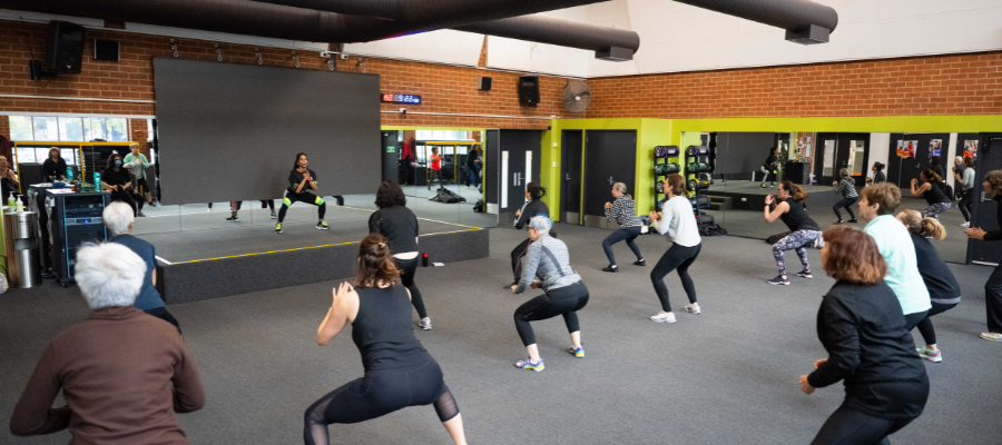 People in Zumba class facing instructor
