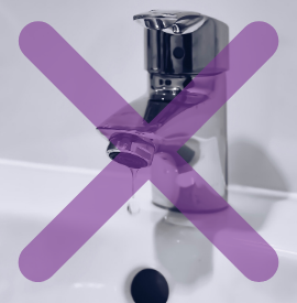 A tap dripping with a purple cross over it