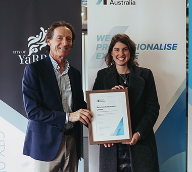 Fitness Australia CEO Barrie Elvish presenting Yarra Leisure's Quality Accreditation certificate to Yarra City Council Mayor Cr Danae Bosler